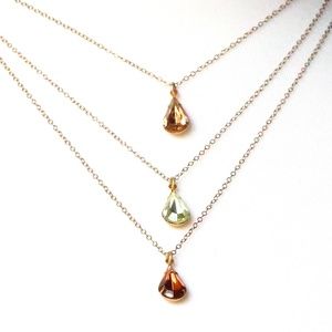 Triple stone triple strand goldtone chain necklace